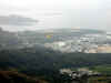 MiniCorado on exploring the uncharted slope.  You can see Tai Po Industrial Estate below (72292 bytes)