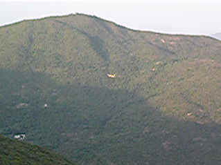 Landing a Brisk III in Shek O Peak (4350355 bytes)